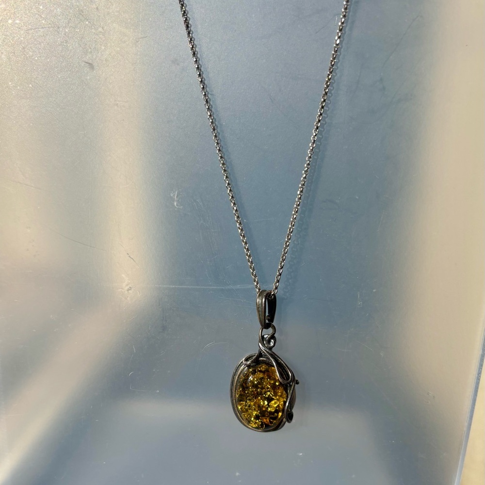Vintage amber, sterling silver pendant.
